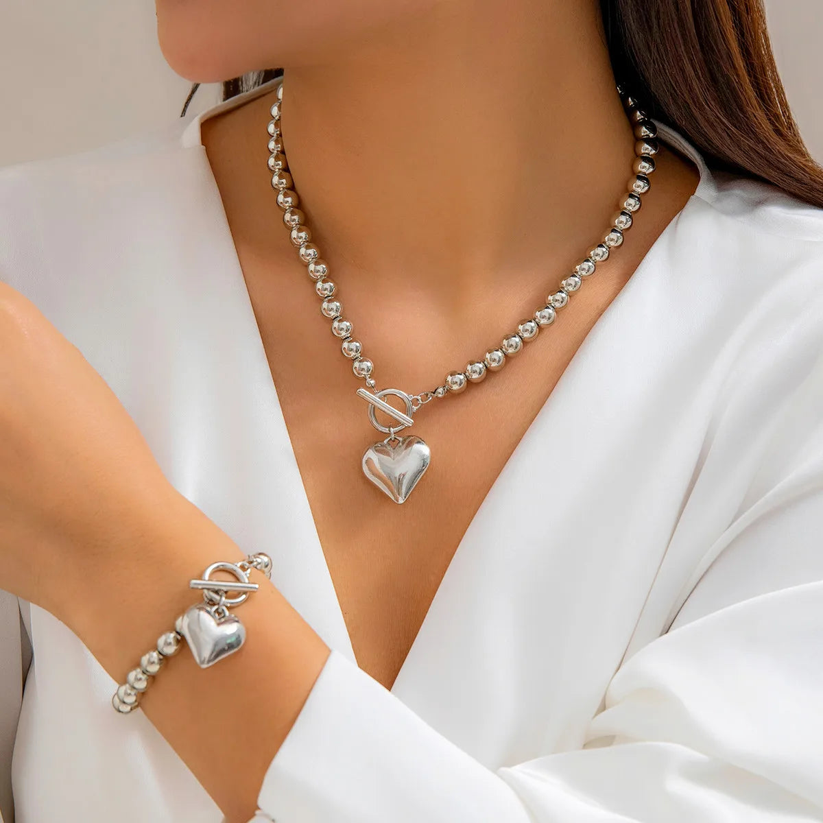 Hollow Heart Pendant Necklace & Bracelet