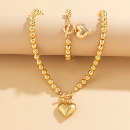 Hollow Heart Pendant Necklace & Bracelet